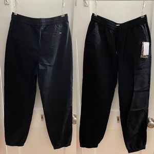 Vans black pants with drawstring waist and stretchy ankles, straight fit